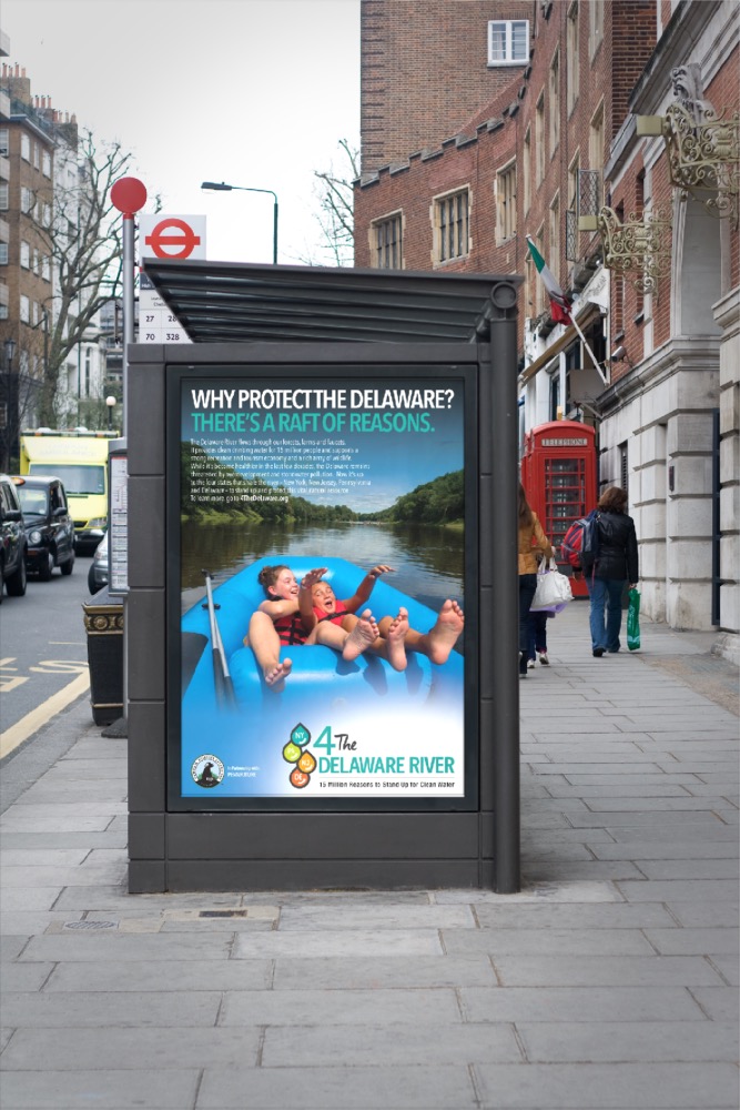 A bus stop with a poster on it