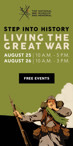 A poster with an image of a man holding a rifle.